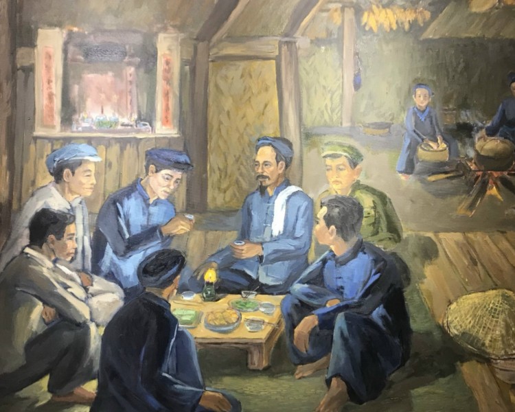Tranh: Lãnh tụ Nguyễn Ái Quốc và các đồng chí cán bộ cách mạng dự bữa cơm tết tại gia đình ông Lý Quốc Súng, ngày 28/01/1941 (02/Giêng/Tân tỵ) - Tư liệu trưng bày